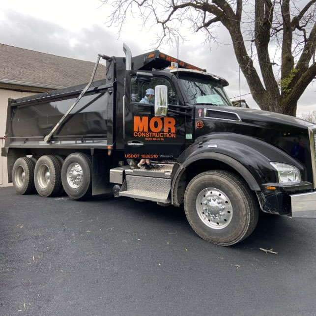 MOR Construction dump truck at work in Philadelphia, PA, providing expert construction services.